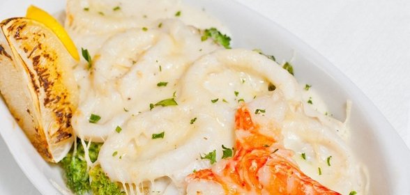 Кальмары в сметанном соусе
