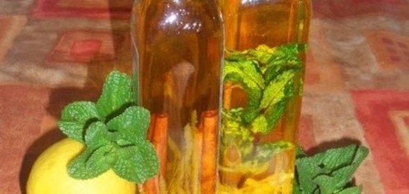 Купажное оливковое масло с лимоном, апельсином и корицей и лимонное с мятой