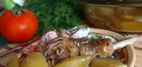 Курица,запечённая в духовке с картофелем.