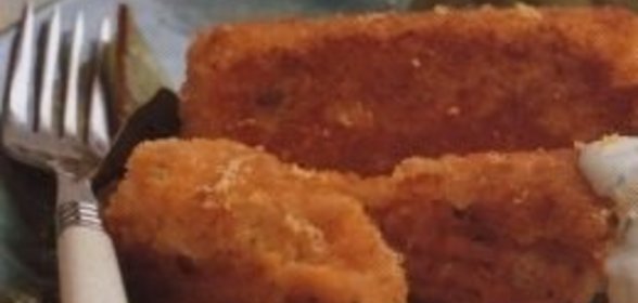 Запеченный карп, фаршированный квашеной капустой