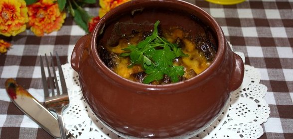 Мясо с грибами и сыром в духовке