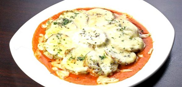 Баклажаны, запеченные с помидорами