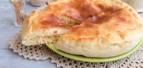 Пирог с начинкой из жареной квашеной капусты