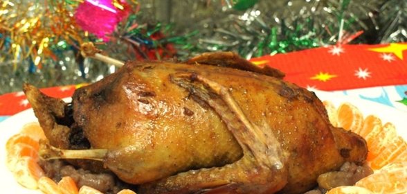 Утка фаршированная яблоками,апельсинами и черносливом