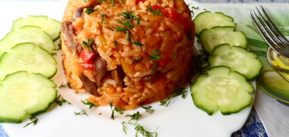 Рис с куриными сердечками и овощами