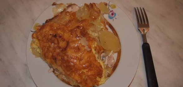 Индейка, запеченная с картофелем под сыром
