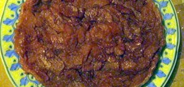 Пирог из яблок, покрытый слоеным тестом