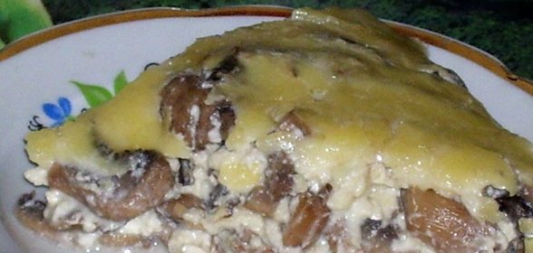 Шампиньоны в сметане с сыром
