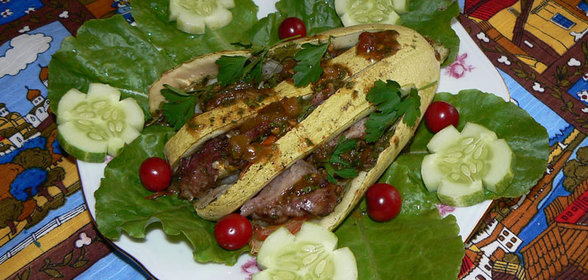 Веер из цукини со свининой под кислосладким пряным соусом