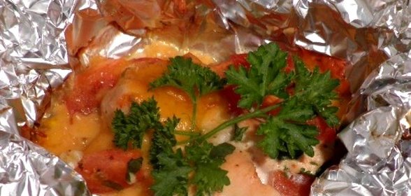Курица в духовке с помидорами