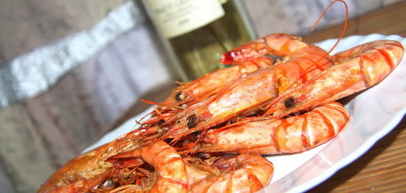 Жареные тигровые креветки в лимонном масле