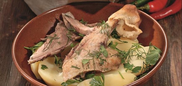 Гусь, фаршированный картофелем