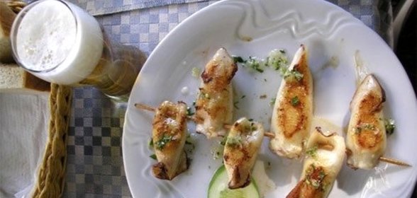 Фаршированные кальмары с грибами и рисом