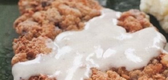 Говяжьи отбивные с чесночной подливкой