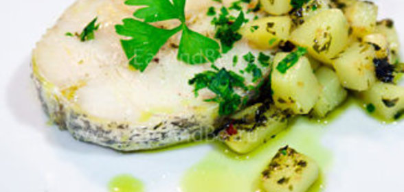 Хек в зеленом чесночном соусе