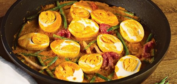 Яйца под соусом карри