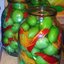 Маринованные зеленые помидоры шпигованные чесноком