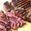 Говядина с картофельным пюре, шпинатом и ягодным соусом