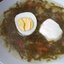Салат из квашеной капусты с финиками и изюмом