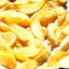 Запеченые на гриле дольки картофеля с луком