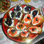 Говядина с маслинками
