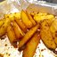 Запеченные картофельные дольки с чесноком и розмарином