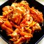 Щука, тушенная с морковью и луком