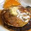Кукурузные оладьи с черникой и апельсиновым маслом