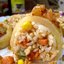 Кальмары, фаршированные рисом и овощами