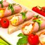 Бутерброды с рулетиками из ветчины и салатом
