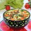 Овощное рагу из кабачков с капустой, морковью и томатным соусом