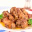 Куриные крылышки с помидорами в соке из черной смородины (в мультиварке)