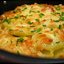 Слоеный картофель, запеченный под голубым сыром