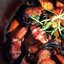 Куриные бедрышки с беконом и вешенками