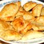 Слоеные пирожки с жареной капустой и луком