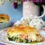 Свинина, запеченная с луком и сыром