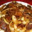 Мясо с луком на сковороде