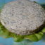 Закусочный торт из кабачков с пастообразным сыром, грибами и зеленью