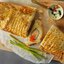 Салат из шпината с беконом, пряностями и оливковым маслом