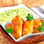 Куриные крылышки, запеченные в розовом соусе