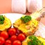 Ананасы, фаршированные куриным филе, запеченные под сыром