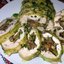 Куриный рулет с грибами в кабачке