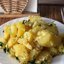 Картофель тушеный в молоке с сыром и зеленью