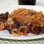 Куриная печенка с тушеной капустой