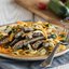 Жареная мойва с овощами