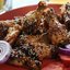 Куриные крылышки в апельсиновой глазури и кунжуте