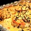 Запеченная острая свинина под помидорами, сыром и грибами