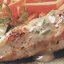 Кабачки, фаршированные овощами, в томатном соусе