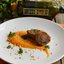 Телятина с тыквенным пюре, грецкими орехами и кинзой