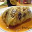 Куриные бедрышки, запечённые в листьях квашеной капусты